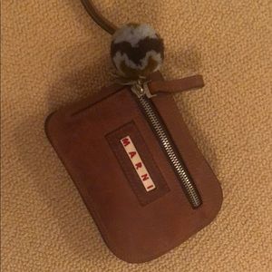 Marni bag that zips up into a small case